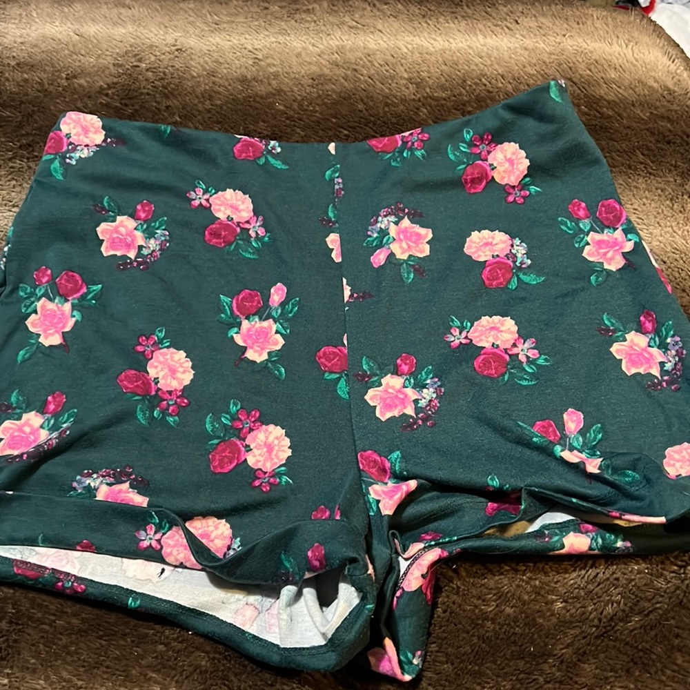 green flowered shorts